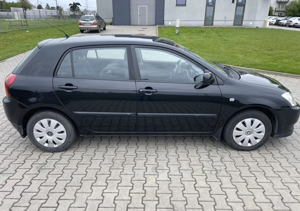 Toyota Corolla cena 7900 przebieg: 205133, rok produkcji 2003 z Warszawa małe 92